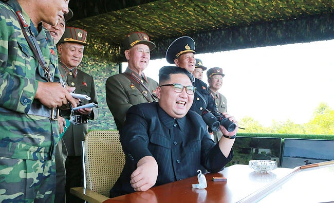 North Korean leader Kim Jong Un guides a target-striking contest of the special operation forces of the Korean People's Army (KPA) to occupy islands in this undated photo provided by KCNA in Pyongyang on Friday. (Reuters)