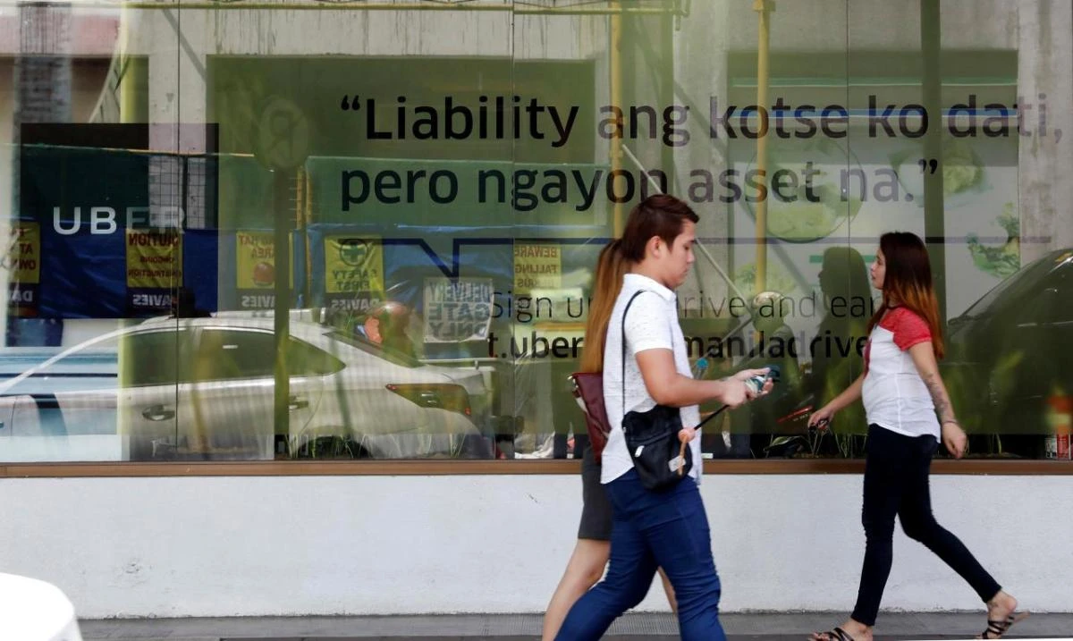 The Uber freeze has attracted public attention because commuters regard the ride-hailing app as more reliable and competitive than mainstream transport services. (Reuters)
