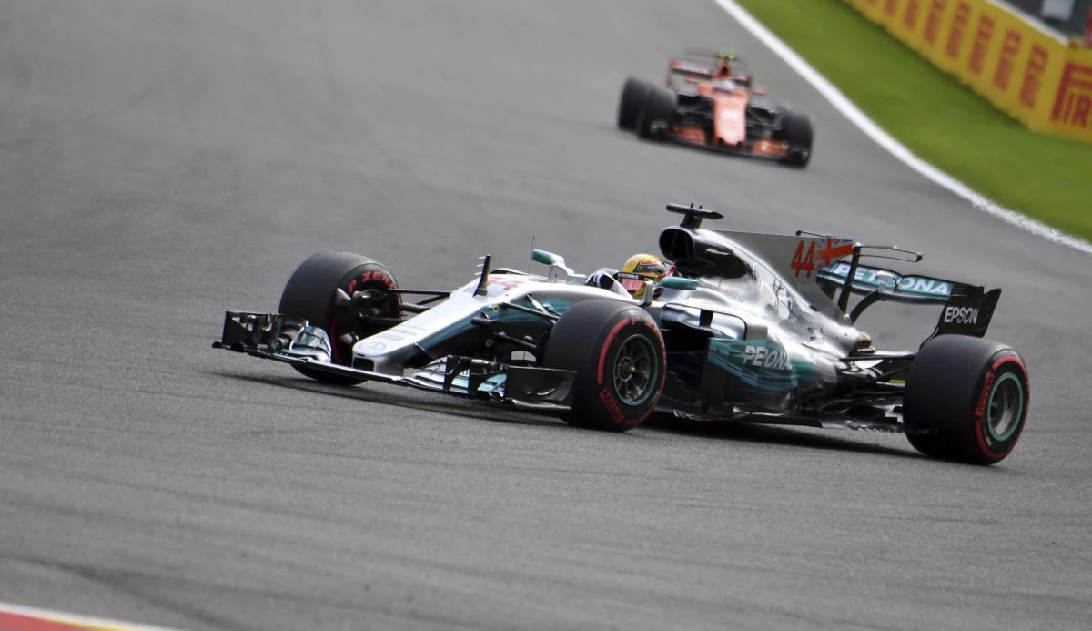 Mercedes driver Lewis Hamilton of Britain, foreground, steers his car during the qualifying session ahead of the Belgian Formula One Grand Prix in Spa-Francorchamps, Belgium, on Aug 26, 2017. (AP)