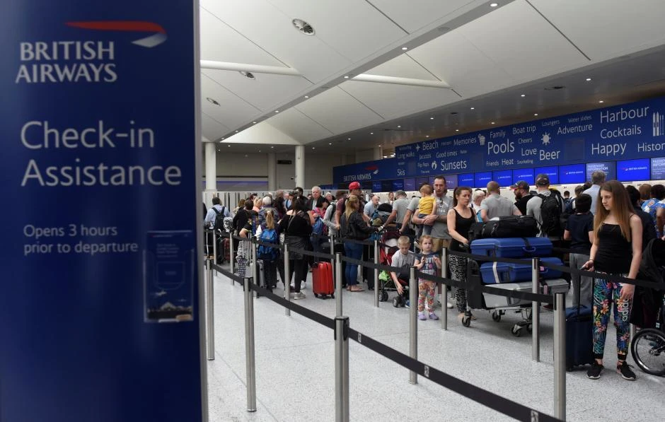 BA said difficulties processing passengers after a new electronic gate system was introduced last year were causing long waits in queues. (Reuters)