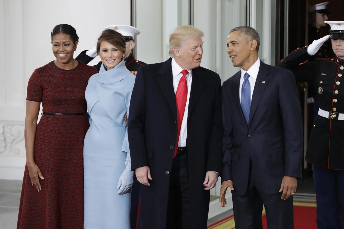 In this Jan. 20, 2017 file photo, President Barack Obama and first lady Michelle Obama pose with President-elect Donald Trump and his wife Melania at the White House in Washington. As President Donald Trump’s administration alters some parts of the former first lady’s legacy, Mrs. Trump is keeping other parts of it alive, from public policy to high fashion to family ties. (AP)