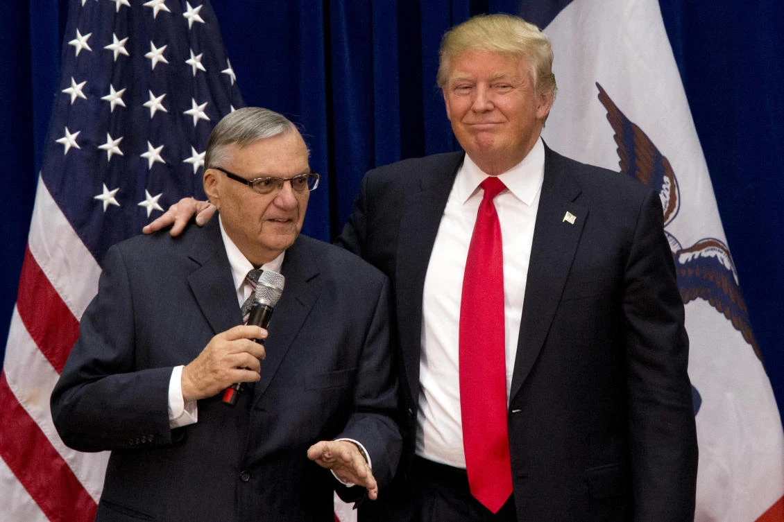 In this Jan. 26, 2016 file photo, then-Republican presidential candidate Donald Trump is joined by Joe Arpaio, the sheriff of metro Phoenix, at a campaign event in Marshalltown, Iowa. President Donald Trump has pardoned former sheriff Joe Arpaio following his conviction for intentionally disobeying a judge's order in an immigration case. The White House announced the move Friday night, Aug. 25, 2017, saying the 85-year-old ex-sheriff of Arizona's Maricopa County was a "worthy candidate" for a presidential pardon. (AP)