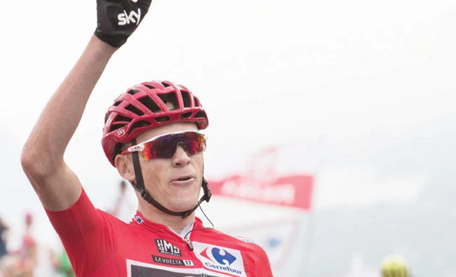 Sky's British cyclist Chris Froome celebrates as he crosses the finish line to win the 9th stage of the 72nd "La Vuelta" Tour of Spain cycling race on Sunday. (AFP)