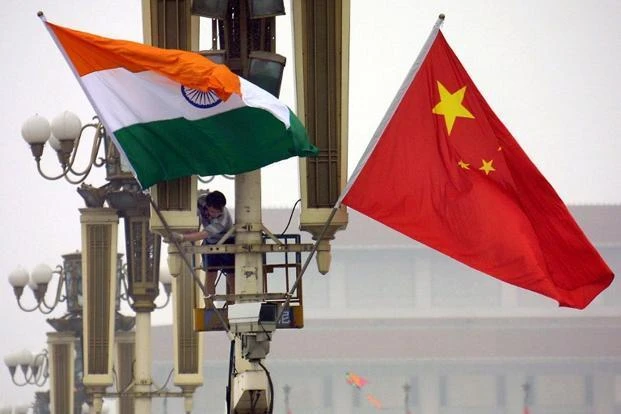 China said Monday it was “pleased” that India had agreed to withdraw troops from a disputed border area in the Himalayas following a months-long stand-off. (AFP)
