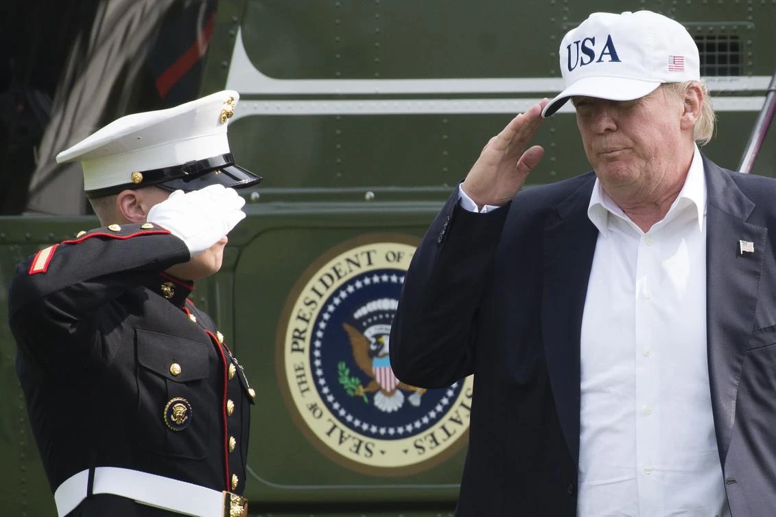US President Donald Trump walks from Marine One upon arrival on the South Lawn of the White House in Washington, DC, on August 27, 2017. (AFP)