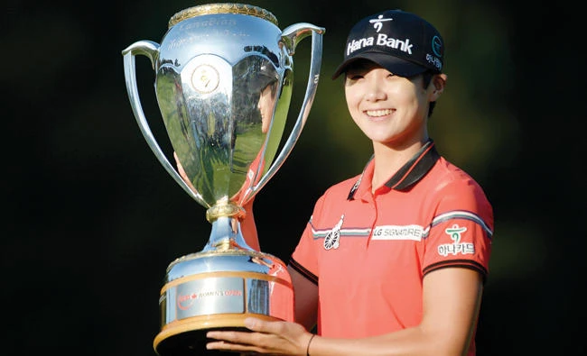 Sung Hyun Park, of South Korea, poses for a photo with the trophy after winning the 2017 Canadian Pacific Women's Open in Ottawa on Sunday. (AP)
