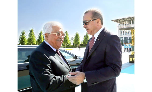 Turkish President Recep Tayyip Erdogan meets with Palestinian President Mahmoud Abbas in Ankara on Monday. (Reuters)