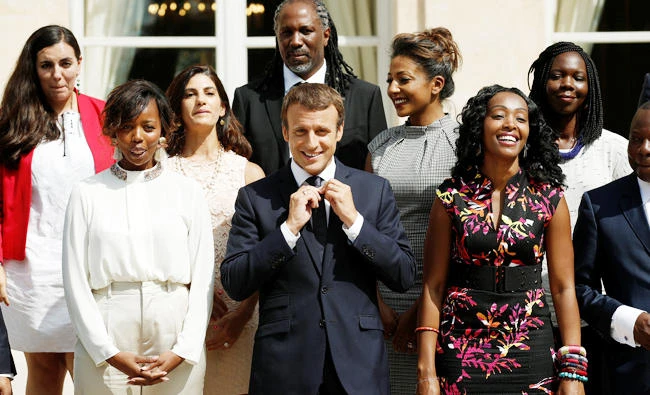 French President Emmanuel Macron poses with members of the new Presidential Council in charge of Africa at the Elysee Palace in Paris. (Reuters)