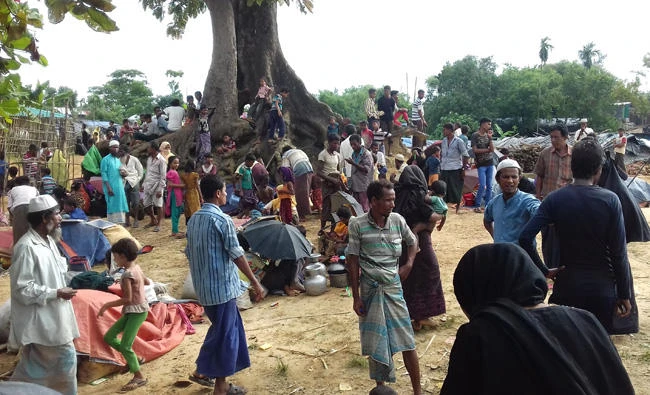 Rohingya people find refuge at Kutupalong refugee camp near the town of Ukhia in Bangladesh’s Cox’s Bazar district on August 29, 2017, after fleeing violence in Myanmar’s Rakhine state. (AFP)