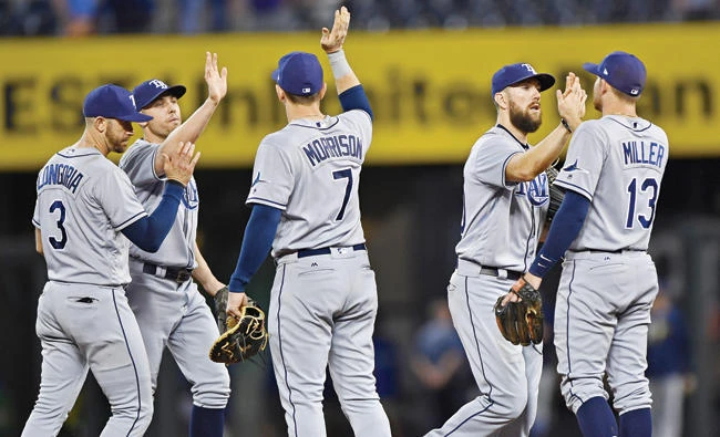 Tampa Bay Rays players celebrate after defeating the Kansas City Royals at Kauffman Stadium Monday. (USA TODAY Sports)