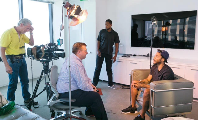 Cleveland Cavaliers point guard, Derrick Rose, right, is interviewed by Associated Press NBA writer Tim Reynolds, sitting, left, at his agent’s Wasserman Media Group offices in Los Angeles on Friday. (AP)
