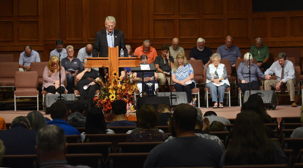 Clovis Mayor David Lansford leads the assembly in prayer during a vigil at Central Baptist Church for the victims of Monday's deadly shooting at the Clovis Carver Public Library in Clovis, N.M., Tuesday, Aug. 29, 2017. Lansford has said things could have been much worse had it not been for the quick response, training and courage of police. He calls the shooting tragic and senseless. (AP)