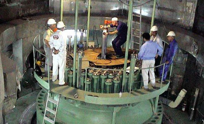 Technicians measuring parts of Iran's Bushehr nuclear power plant in this file photo. (AP)