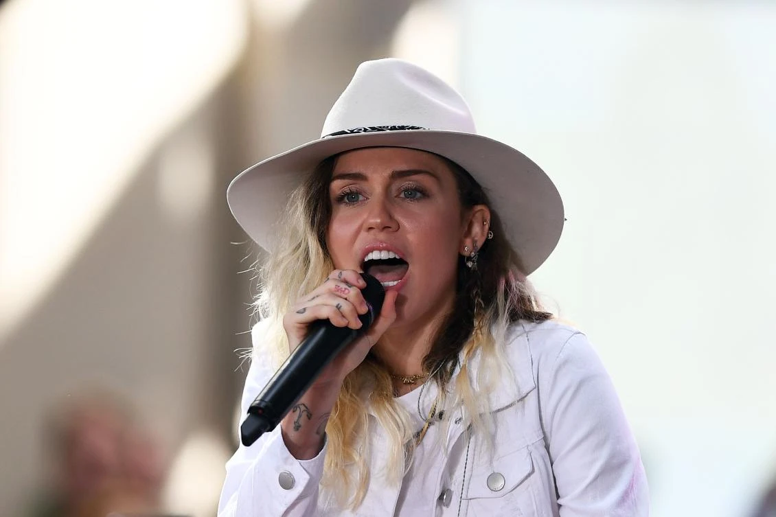 This file photo taken on May 26, 2017 shows US singer Miley Cyrus performing on stage during NBC's Today show at the Rockefeller Plaza in New York City. Pop star Miley Cyrus on August 31, 217 tearfully announced she was giving $500,000 to victims of Hurricane Harvey, becoming the latest celebrity to donate after the mega-storm ravaged Texas. The singer and actress, appearing on Ellen DeGeneres's television show, broke down in tears as she discussed seeing the devastation from the storm. (AFP)