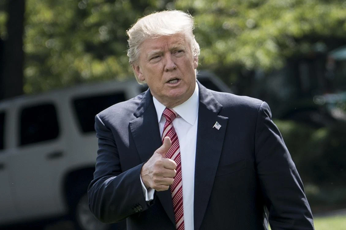 US President Donald Trump walks to Marine One on the South Lawn of the White House in Washington, DC, on August 25, 2017. (File photo by AFP)