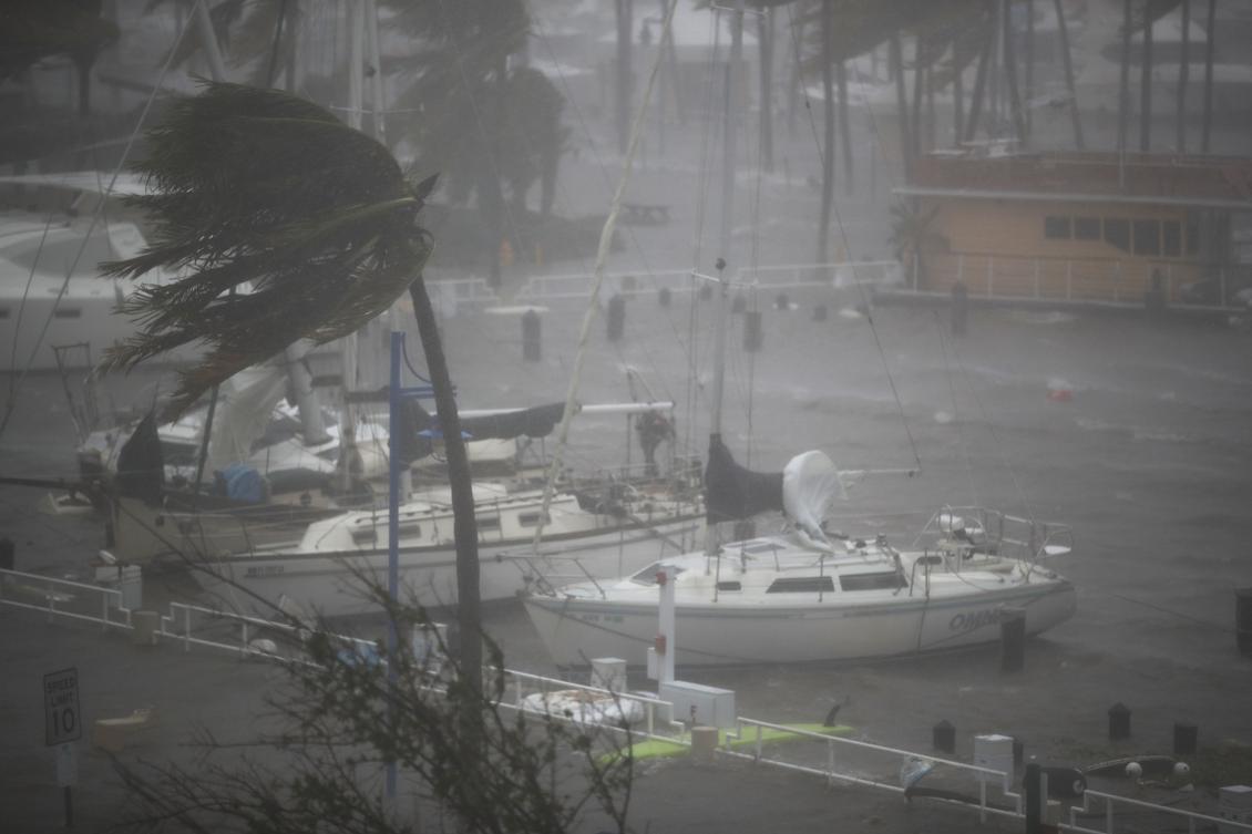 MIAMI, FL - SEPTEMBER 10: Boats ride out Hurricane Irma in a marina on September 10, 2017 in Miami, Florida. Hurricane Irma made landfall in the Florida Keys as a Category 4 storm on Sunday, lashing the state with 130 mph winds as it moves up the coast. Joe Raedle/Getty Images/AFP == FOR NEWSPAPERS, INTERNET, TELCOS & TELEVISION USE ONLY ==