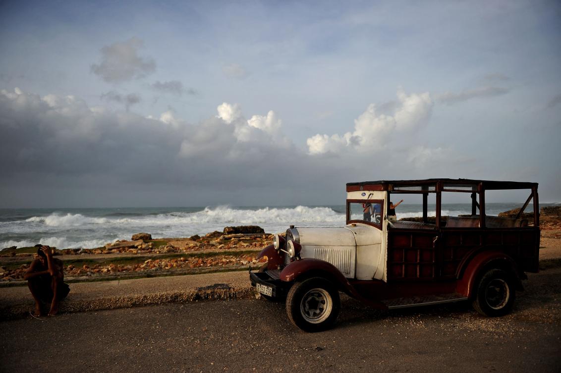 View of damages after the passage of Hurricane Irma, in Cojimar neighborhood in Havana, on September 10, 2017. Residents of Cuba's historic capital Havana were waist-deep in floodwaters after Hurricane Irma, on its way to Florida, swept by, cutting off power and forcing the evacuation of more than a million people. / AFP / YAMIL LAGE