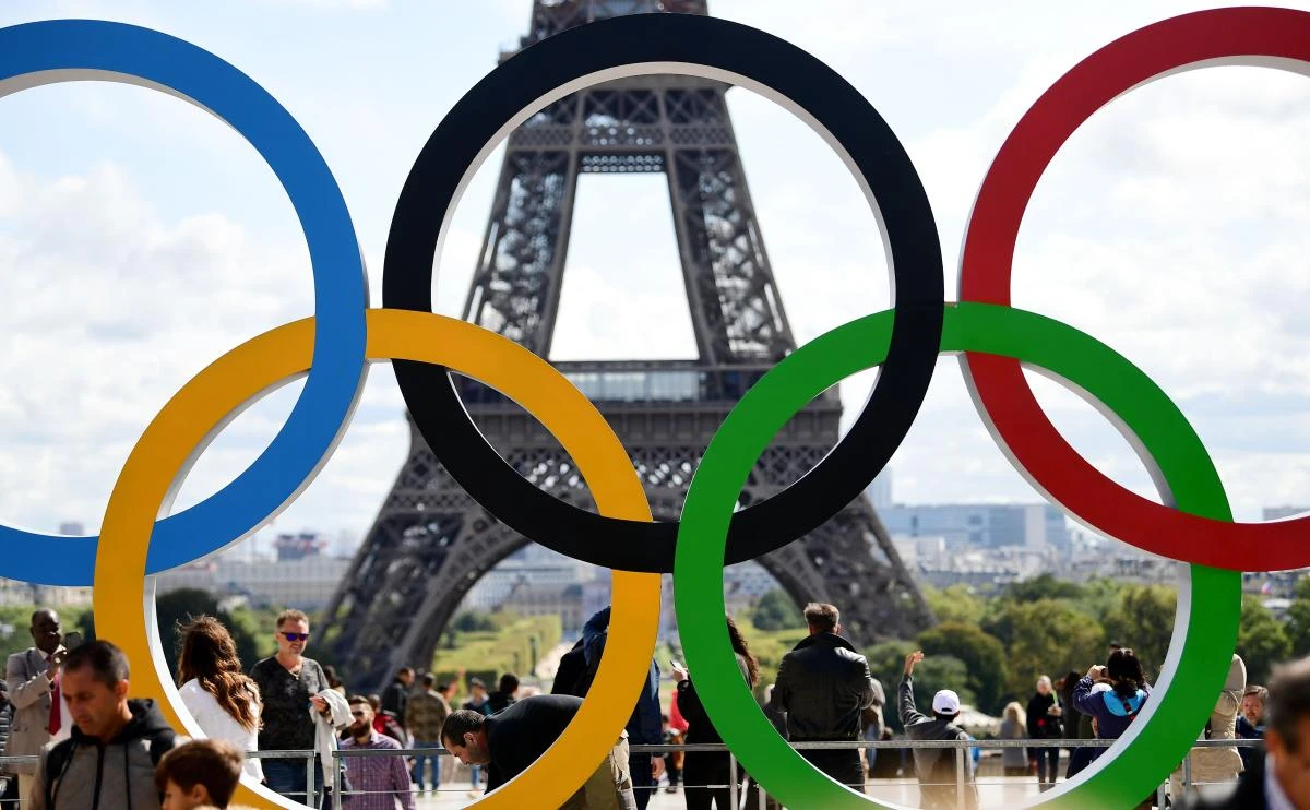A picture taken on September 14, 2017 shows the Olympics Rings on the Trocadero Esplanade near the Eiffel Tower in Paris, after the International Olympic Committee named Paris host city of the 2024 Summer Olympic Games. The International Olympic Committee named Paris and Los Angeles as hosts for the 2024 and 2028 Olympics on September 13, 2017, crowning two cities at the same time in a historic first for the embattled sports body. / AFP / FRANCK FIFE