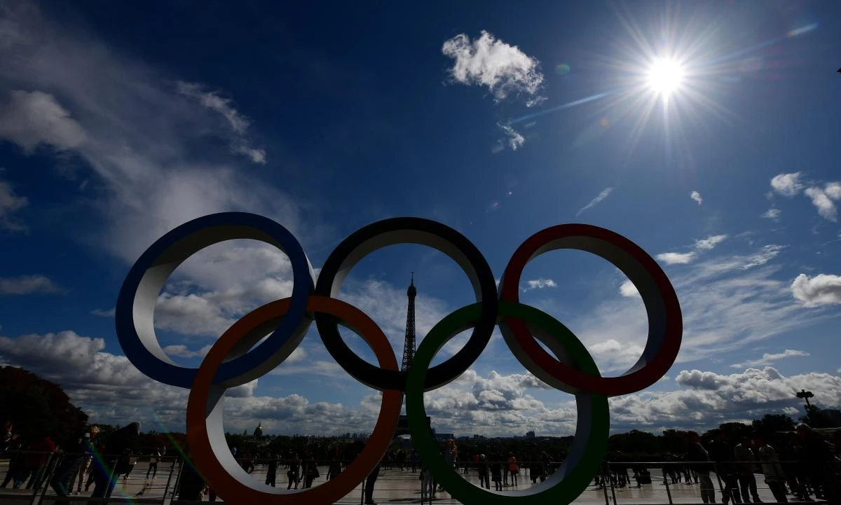 A picture taken on September 14, 2017 shows the Olympics Rings on the Trocadero Esplanade near the Eiffel Tower in Paris, after the International Olympic Committee named Paris host city of the 2024 Summer Olympic Games. The International Olympic Committee named Paris and Los Angeles as hosts for the 2024 and 2028 Olympics on September 13, 2017, crowning two cities at the same time in a historic first for the embattled sports body. / AFP / FRANCK FIFE