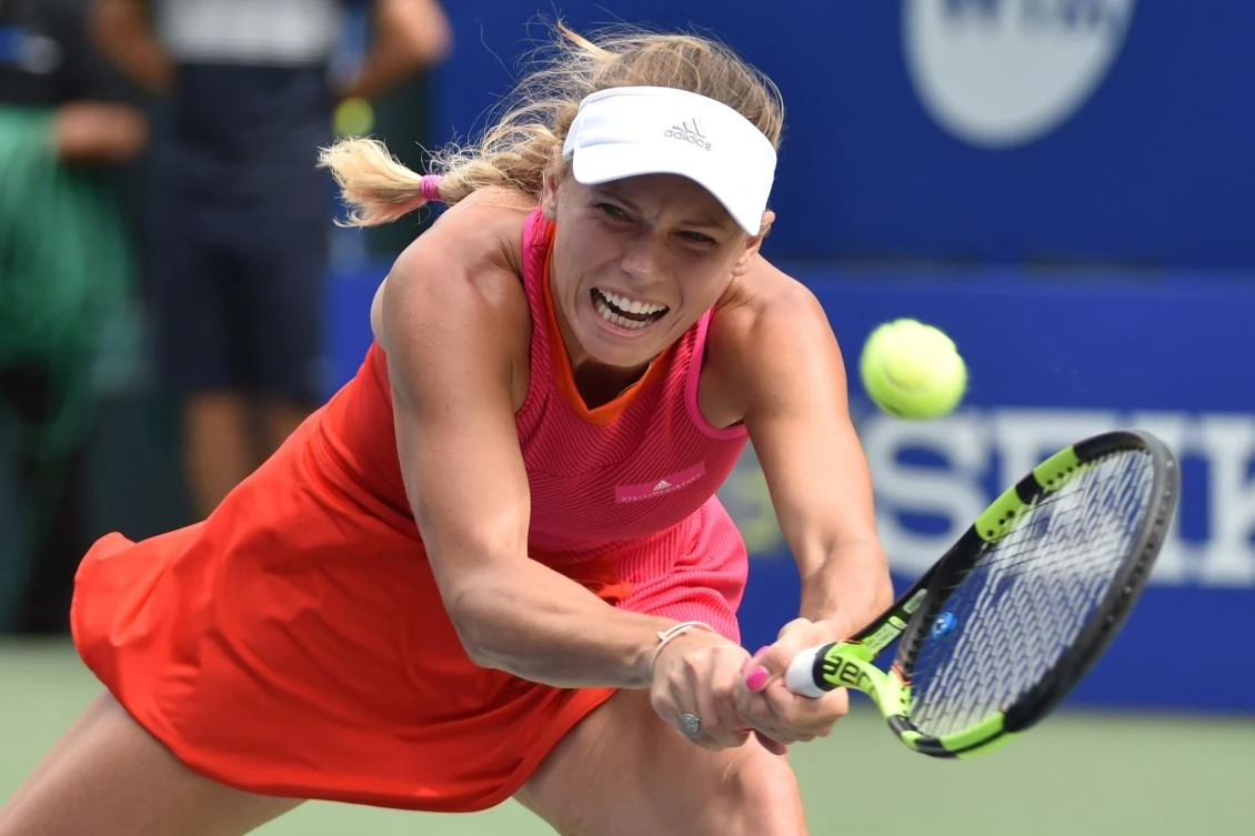 Caroline Wozniacki of Denmark hits a return against Anastasia Pavlyuchenkova of Russia during the women’s singles final at the Pan Pacific Open tennis tournament in Tokyo. (AFP)