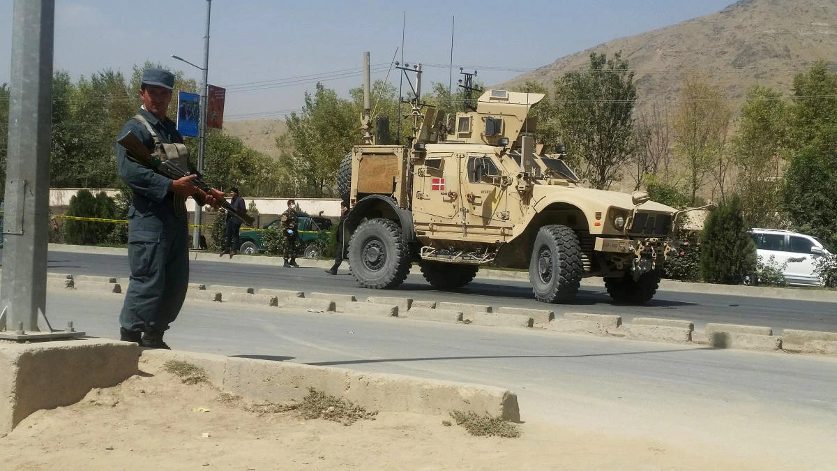 An Afghan policeman keeps watch at the site of a car bomb attack in Kabul, Afghanistan, on September 24, 2017. (REUTERS)