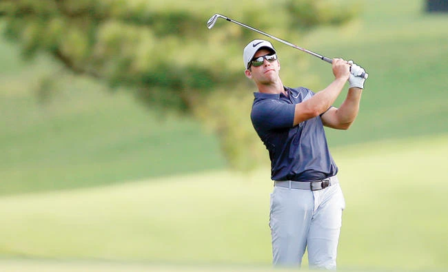 Paul Casey hits his approach shot on the 17th fairway during the third round of the Tour Championship golf tournament at East Lake Golf Club on Saturday. (USA TODAY Sports)