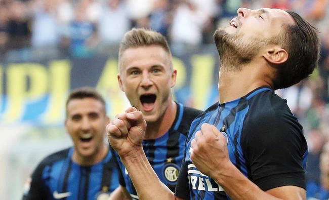 Inter Milan’s Danilo D’Ambrosio, right, celebrates after scoring during a Serie A soccer match between Inter Milan and Genoa at Milan’s San SIro Stadium Sunday. (AP)
