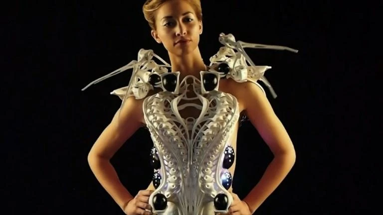 A model displaying Anouk Wipprecht’s ‘Spider Dress’ which is a 3-D printed garment, topped with a collar that is studded with robotic spider legs. (AFP)