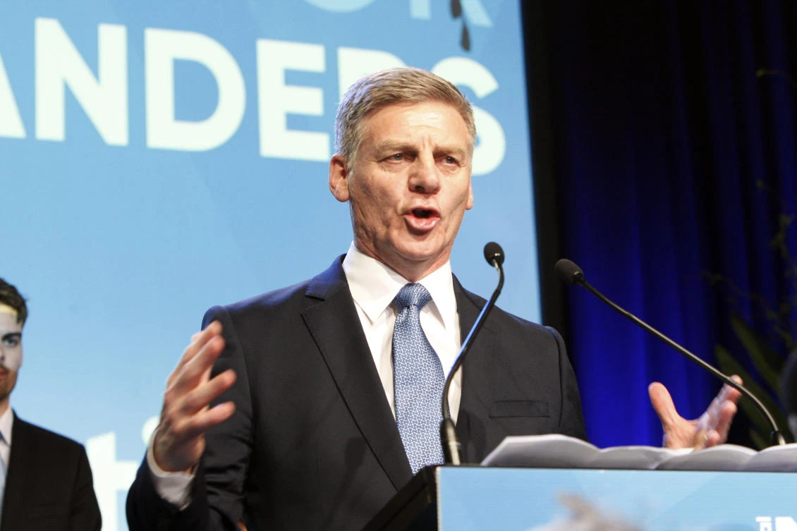 New Zealand’s Prime Minister Bill English talks to hundreds of supporters after election results are announced in Auckland, New Zealand on Saturday, September 23, 2017. (File photo by AP)