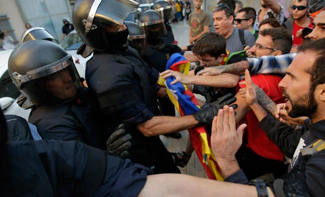 Catalan police say independence vote divides their loyalties