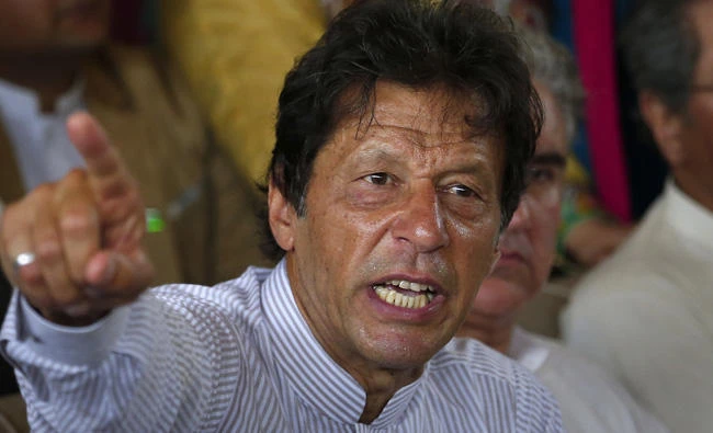 Pakistani opposition leader Imran Khan says US President Trump should talk with the Taliban and stop suspecting Pakistan of harboring them. (AP Photo/Anjum Naveed, File)
