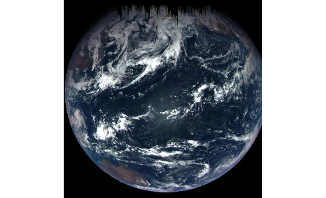 This NASA handout photo released on September 27, 2017 shows a color composite image of Earth taken on September 22 by the MapCam camera on NASA’s OSIRIS-REx spacecraft. (AFP)