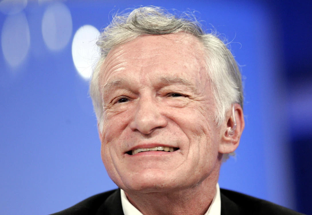 Playboy founder Hugh Hefner smiles as he addresses questions at the panel for E! networks television show “The Girls Next Door” at the Television Critic’s Association Summer press tour on July 17, 2005. (Reuters)
