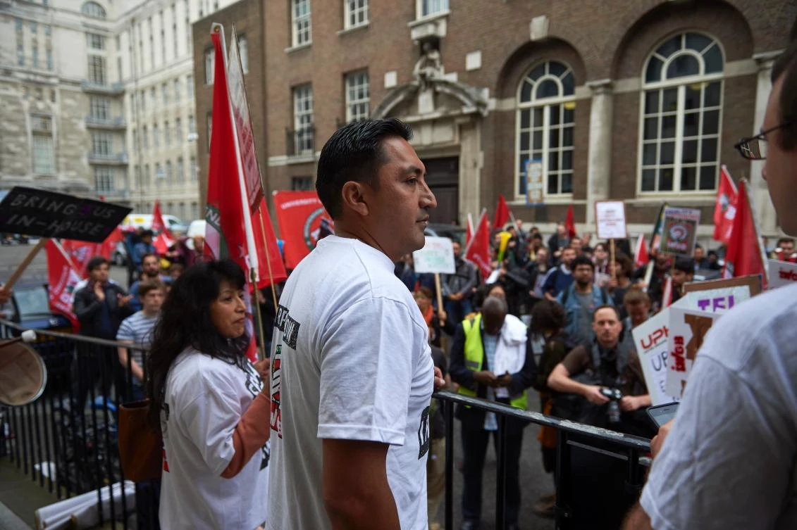 Henry Chango Lopez, President of the Independent Workers' Union of Great Britain (IWGB) finishes speaking at a protest against the gig economy in central London on September 27, 2017. The Independent Workers of Great Britain (IWGB) trade union is representing two Uber drivers who brought a landmark case against Uber demanding that its drivers have official worker status. (AFP)