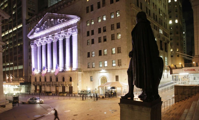 The New York Stock Exchange is shown in this file picture. US stocks are lower early Thursday, Sept. 28, 2017, but energy companies are higher as the price of oil rises. (AP Photo/Mark Lennihan, File)