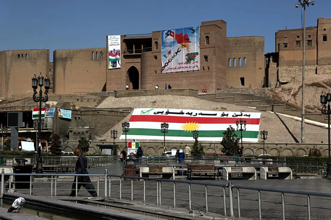 Kurdish flags and pro-independence items hang on Irbil's citadel in central Irbil. (AP)