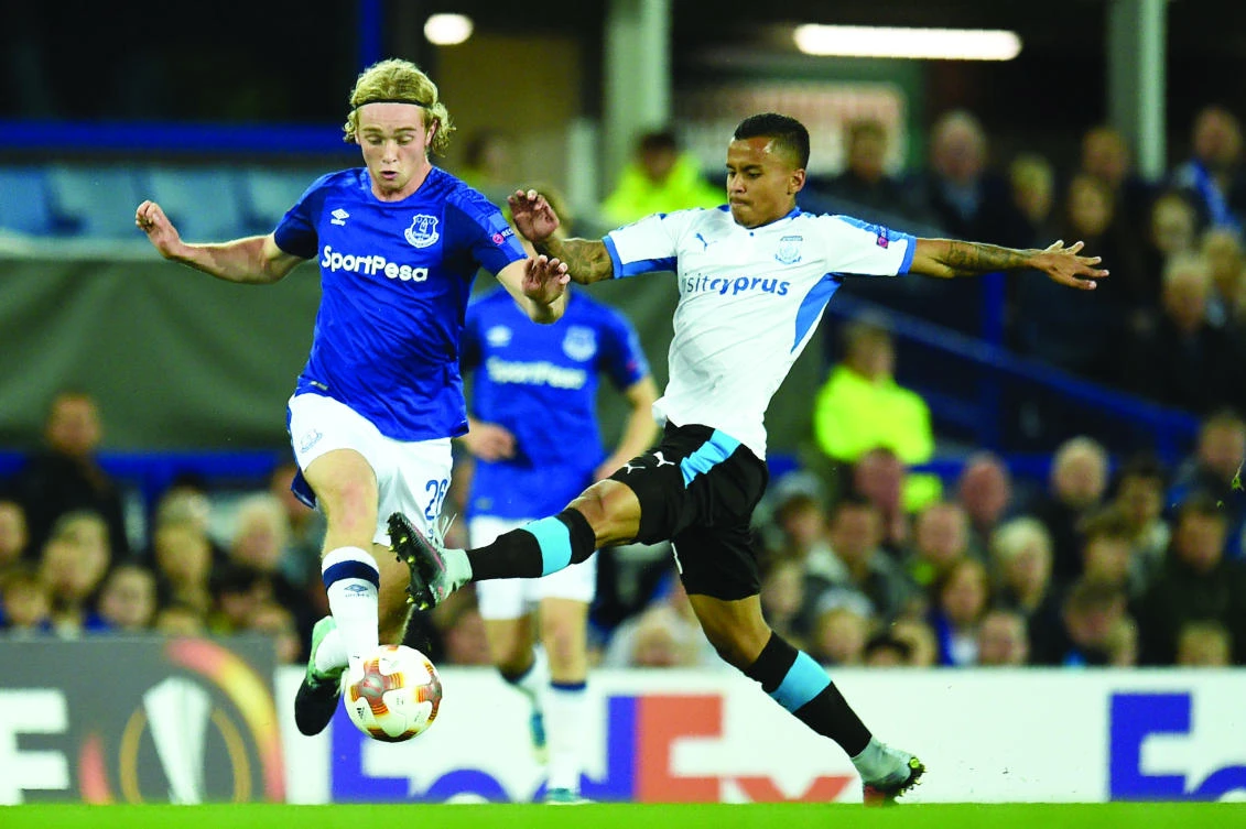 Everton’s English midfielder Tom Davies, left, vies with Apollon Limassol’s Croatian midfielder Antonio Jakolis during the UEFA Europa League Group stage match between Everton and Apollon Limassol at Goodison Park, in Liverpool on Thursday. (AFP)