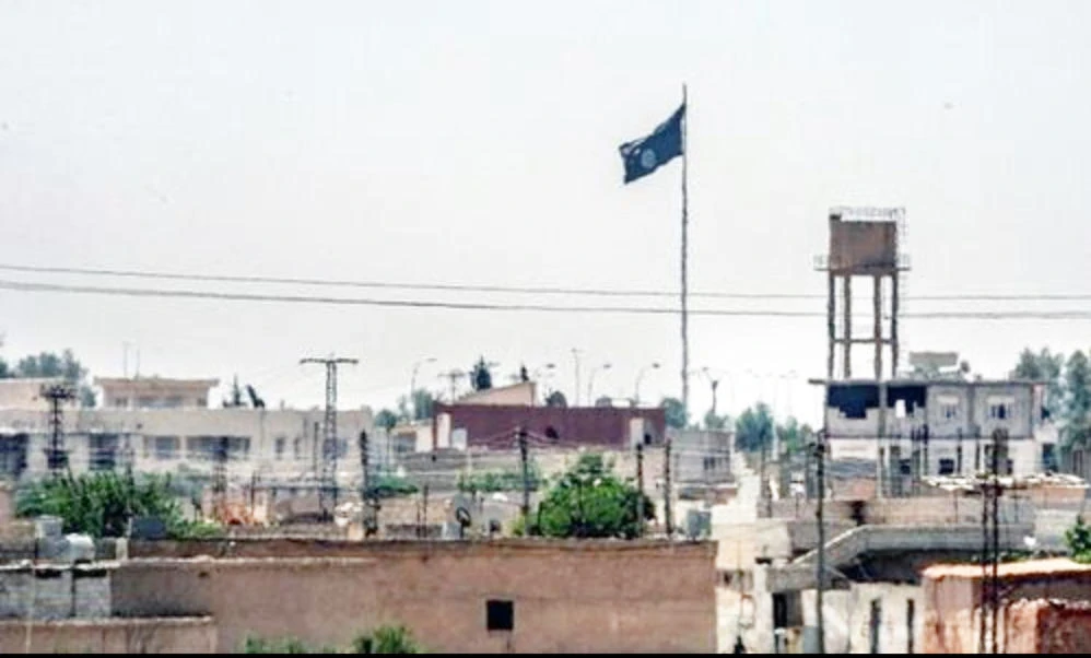 A Daesh flag is seen hoisted in Islamabad in this Sept. 24 screenshot from Dawn TV.