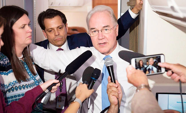 This file photo taken on July 24, 2017 shows US Secretary of Health and Human Services Tom Price speaking with reporters aboard Air Force One in flight during a trip with US President Donald Trump to Beaver, West Virginia, on July 24, 2017, as Trump travels to speak at the National Boy Scout Jamboree in West Virginia. (AFP)