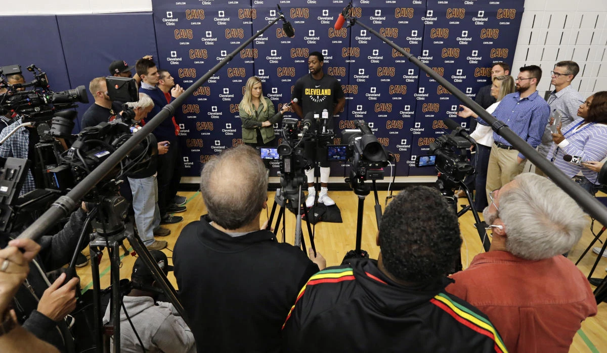 Cleveland Cavaliers’ Dwyane Wade, center, answers questions during a news conference at the NBA basketball team’s training facility on Friday. (AP)
