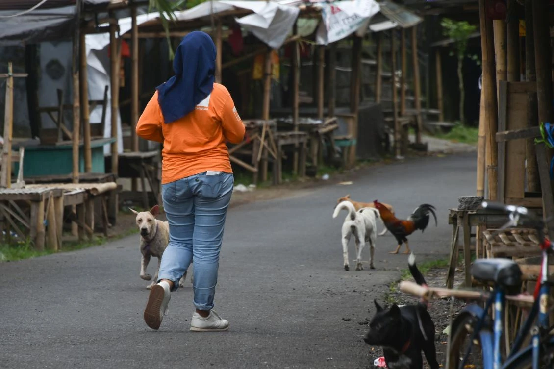 Above, an NGO worker at a deserted village in Sideman, an area close to Mount Agung in Karangasem on the Indonesian resort island of Bali. (AFP)