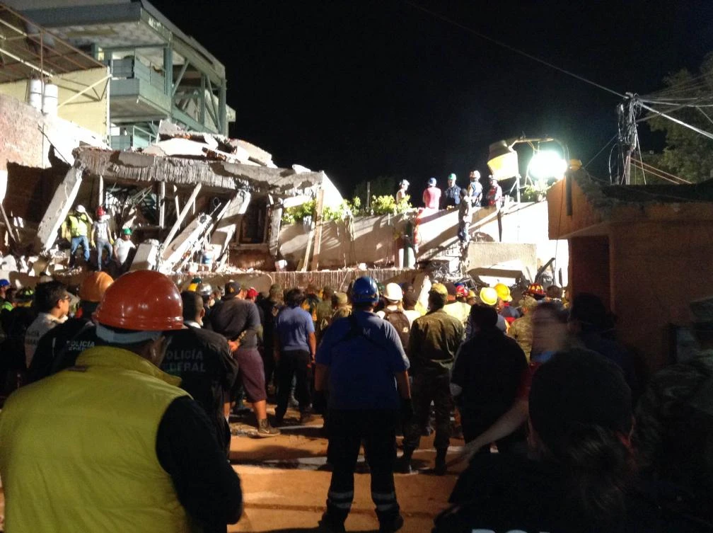 The mayor, education minister and top officials for the district have traded blame over the collapse of Enrique Rebsamen elementary school, above. (AFP)