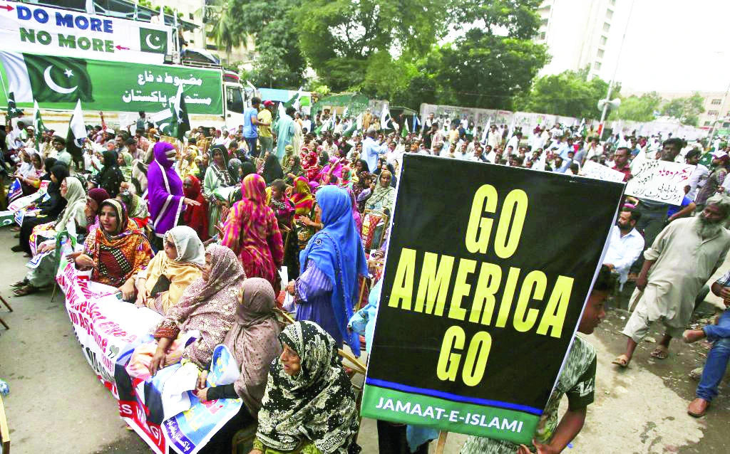 Pakistanis rally against America in Karachi, Wednesday. Protesters objected to US allegation that Islamabad is harboring militants who battle US forces in Afghanistan. (AP)