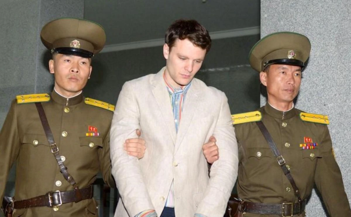 In this photo released by Kyodo, Otto Frederick Warmbier, center, a University of Virginia student who was detained in North Korea since early January, is taken to North Korea’s top court in Pyongyang, North Korea, on March 16, 2016. (File photo: Kyodo via Reuters)