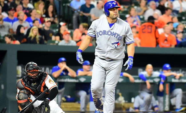 Toronto Blue Jays designated hitter Kendrys Morales hits a home run in the eighth inning against the Baltimore Orioles at Oriole Park at Camden Yards Thursday. (USA TODAY Sports)