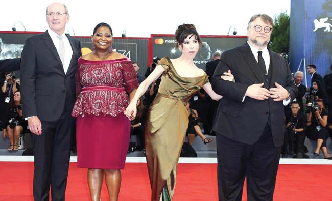 Director Guillermo Del Toro, from right, actors Sally Hawkins, Octavia Spencer and Richard Jenkins pose for photographers upon arrival at the premiere of the film ‘The Shape of Water’ during the 74th edition of the Venice Film Festival in Venice, Italy. (AP)