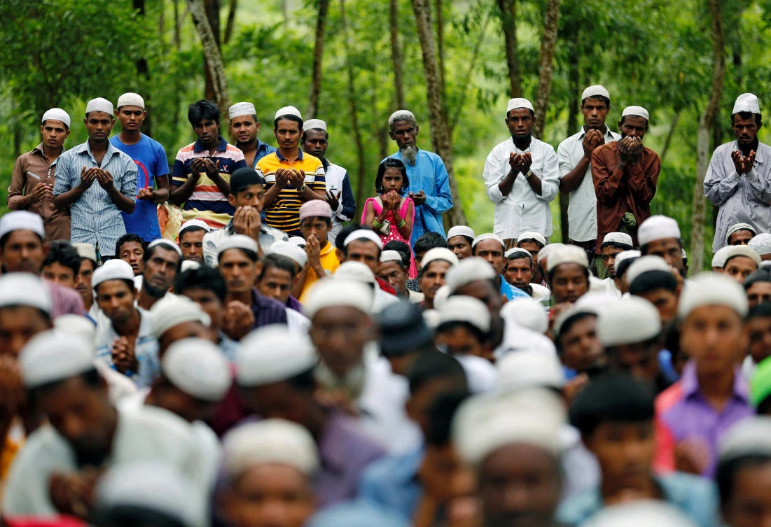 Rohingya refugees take part in Eid Al-Adha prayer near the Kutupalang Makeshift Refugee Camp, in Cox’s Bazar, Bangladesh, on September 2, 2017. (REUTERS)