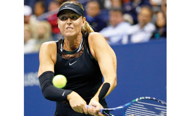 Maria Sharapova, of Russia, returns the ball during a match against Sofia Kenin, of the US, at the US Open tennis tournament in New York Friday. (AP)