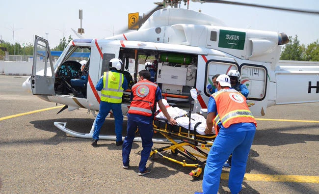 In this August 31, 2017 photo, a Saudi Red Crescent Authority air ambulance transports a sick Hajj pilgrim to a hospital in Makkah. The SCRA also sent an air ambulance to transport a sick seaman from a Greek oil tanker in the Red Sea to a hospital. (SCRA photo via Twitter)