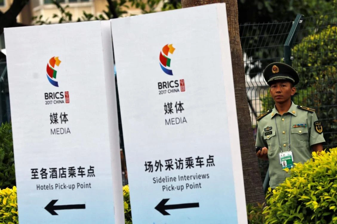 China is being criticized to have done little to remove its own discriminatory policies and market barriers that favor Chinese companies. (Reuters)